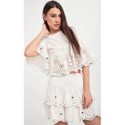 Bluzka BLUGIRL BLUMARINE. Bluzki damskie Blugirl Blumarine, bez wzorów, bez kołnierzyka, bez ramiączek. W wyprzedaży za 487.07 zł.