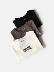 T-shirt z nadrukiem3 pack - wielobarwny. Koszulki dziewczęce Reserved, bez wzorów, z bawełny, bez ramiączek. Za 59.99 zł.