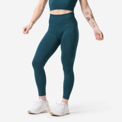 Legginsy do treningu siłowego damskie Domyos bezszwowe. Niebieskie legginsy sportowe damskie DOMYOS, l, bez wzorów, z dzianiny, z podwyższonym stanem, na fitness i siłownię. Za 99.99 zł.