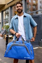 Sportowa, podróżna torba z poliestru Peterson PTN TP27-D. Torby podróżne damskie Peterson, bez wzorów, z tkaniny. Za 84.00 zł.