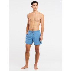 Szorty plażowe Protest Davey. Niebieskie szorty męskie Protest, na lato, bez wzorów. Za 267.00 zł.