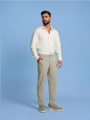 Spodnie chino slim fit w kratę - kremowy. Białe spodnie materiałowe męskie Sinsay, bez wzorów. Za 69.99 zł.