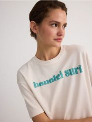 T-shirt boxy z nadrukiem - złamana biel. T-shirty damskie Reserved, l, bez wzorów, z bawełny, bez kołnierzyka. W wyprzedaży za 19.99 zł.