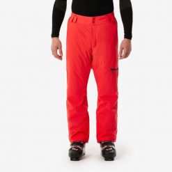 Spodnie narciarskie męskie Wedze 500. Czerwone spodnie materiałowe męskie WED'ZE, bez wzorów, z materiału, sportowe. Za 269.99 zł.