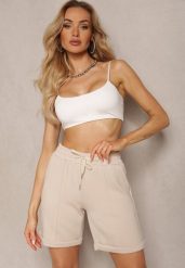 Beżowe Casualowe Szorty High Waist z Kieszeniami Wykończone Gumką Shezetta. Brązowe szorty damskie Renee, bez wzorów, z materiału, klasyczne, z podwyższonym stanem. Za 44.99 zł.
