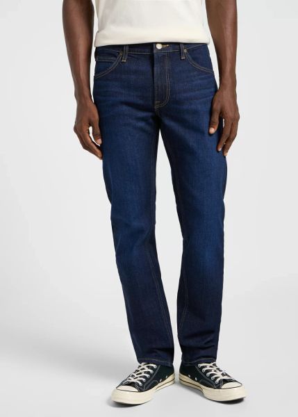 MESKIE SPODNIE LEE DAREN ZIP FLY SIREN INDIGO 112365746. Niebieskie spodnie materiałowe męskie Lee, bez wzorów, z jeansu. Za 219.99 zł.