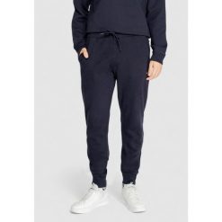 Spodnie Mężczyzna NAPAPIJRI MALIS. Niebieskie spodnie sportowe męskie Napapijri. Za 334.90 zł.