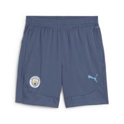 Spodenki treningowe Manchester City 2024/25. Niebieskie szorty męskie Puma, bez kołnierzyka. Za 190.50 zł.