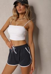 Granatowe Szorty Dresowe z Dodatkiem Bawełny High Waist Wykończone Lamówką Mivorina. Niebieskie spodenki sportowe damskie Renee, bez wzorów, z bawełny, eleganckie, z podwyższonym stanem. Za 24.99 zł.