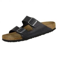 Klapki Birkenstock Arizona WB. Klapki damskie Birkenstock, bez wzorów, z materiału, bez obcasa. Za 449.00 zł.
