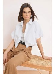 Trendyol Bluzka w kolorze białym rozmiar: 42. Białe bluzki damskie Trendyol, bez wzorów, bez kołnierzyka, bez ramiączek. Za 86.99 zł.