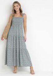 Jasnoniebieska Sukienka Rozkloszowana na Ramiączkach w Kwiaty Hasana. Niebieskie sukienki damskie Born2be, na co dzień, na lato, l, bez wzorów, eleganckie, bez kołnierzyka, bez ramiączek, maxi, proste. W wyprzedaży za 95.99 zł.