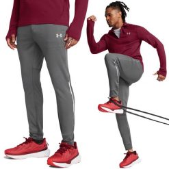 Spodnie treningowe męskie Under Armour wygodne dresowe do ćwiczeń. Szare spodnie dresowe męskie Under Armour, bez wzorów, z dresówki. Za 229.99 zł.