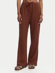 Roxy Spodnie materiałowe Mood Moving ERJX603493 Brązowy ciemny Regular Fit. Brązowe spodnie materiałowe damskie Roxy, bez wzorów, z materiału. Za 259.99 zł.