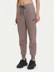 Nike Spodnie dresowe Tech Fleece HV6779 Brązowy Regular Fit. Brązowe spodnie dresowe damskie Nike, xl, bez wzorów, z dresówki. Za 429.99 zł.