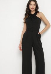 Czarny Taliowany Kombinezon Ozdobiony Paskiem Dollivia. Czarne kombinezony damskie Born2be, l, z aplikacjami, eleganckie, bez kołnierzyka, bez ramiączek. Za 139.99 zł.
