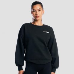 Bluza damska fitness oversize czarna Base. Czarne bluzy sportowe damskie GYMBEAM, m, bez wzorów, z bawełny, bez ramiączek, długie, bez kaptura. Za 127.90 zł.