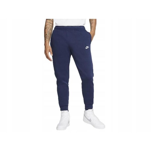 Spodnie dresowe męskie NIKE bawełna ocieplane. Niebieskie spodnie dresowe męskie Nike, bez wzorów, z bawełny. Za 249.99 zł.