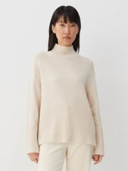 Someday Sweter "Toyah" w kolorze kremowym rozmiar: 40. Brązowe golfy damskie Someday, bez wzorów, z wełny, bez ramiączek. Za 250.45 zł.