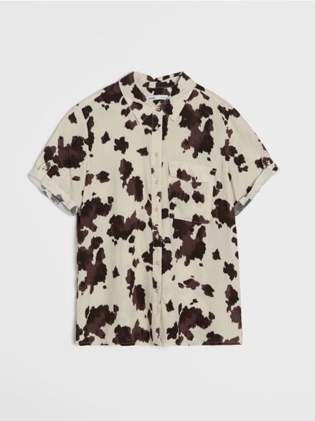 Wiskozowa koszula z ozdobnymi guzikami - wielobarwny. Koszule damskie Sinsay, l, bez wzorów, z wiskozy, bez kołnierzyka, bez ramiączek. Za 25.99 zł.