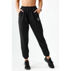 Spodnie dresowe sportowe dla kobiet Rough Radical Pery. Czarne spodnie dresowe damskie ROUGH RADICAL, m, z dresówki, na fitness i siłownię. W wyprzedaży za 135.92 zł.