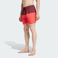 Szorty do pływania Colorblock CLX. Czerwone szorty męskie Adidas, bez wzorów, z materiału. Za 159.00 zł.