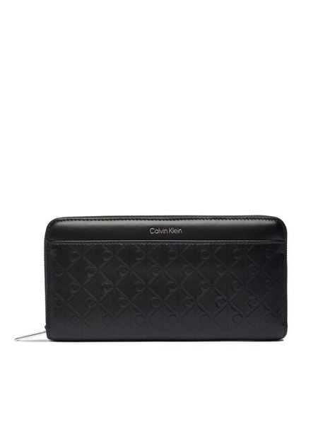 Calvin Klein Portfel Emblem Aop Embossed Long Wallet LV04F1097G Czarny. Czarne portfele damskie CALVIN KLEIN, bez wzorów, ze skóry. Za 329.99 zł.