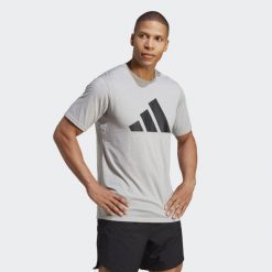 Koszulka adidas Essentials Feelready Logo. Czarne bluzki sportowe damskie Adidas, l, bez wzorów, z bawełny, bez ramiączek. Za 149.00 zł.