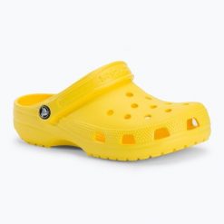Klapki Crocs Classic. Żółte klapki damskie Crocs, bez wzorów, bez obcasa. Za 89.99 zł.