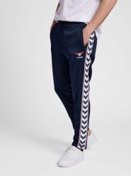 Spodnie dresowe slim fit Hummel IC Lerby. Niebieskie spodnie sportowe damskie HUMMEL, xs, z dresówki, do biegania. Za 319.00 zł.