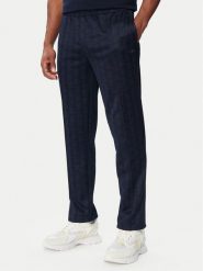 Lacoste Spodnie dresowe XH0197 Granatowy Regular Fit. Niebieskie spodnie dresowe męskie Lacoste, bez wzorów, z dresówki. Za 769.99 zł.