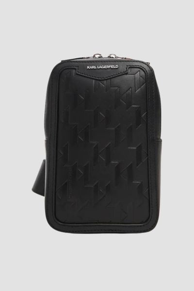 KARL LAGERFELD Saszetka męska skórzana z monogramem. Czarne saszetki męskie Karl Lagerfeld, ze skóry. W wyprzedaży za 759.99 zł.