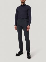 Pierre Cardin Spodnie w kolorze granatowym rozmiar: W33/L32. Niebieskie spodnie materiałowe męskie Pierre Cardin, z aplikacjami, z materiału, klasyczne. Za 140.86 zł.