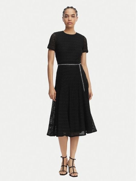 MICHAEL Michael Kors Sukienka codzienna MS683DUKS1 Czarny Regular Fit. Czarne sukienki damskie MICHAEL Michael Kors, na co dzień, l, bez wzorów, z syntetyku, bez kołnierzyka, bez ramiączek, proste. Za 1,229.00 zł.