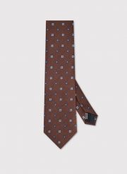 PAKO LORENTE – Brązowy krawat we wzór. Brązowe krawaty i muchy męskie Pako Lorente, bez wzorów, z poliesteru. Za 99.99 zł.