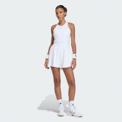 Sukienka Tennis Climacool Y-Dress. Białe sukienki damskie Adidas, s, bez wzorów, sportowe, bez kołnierzyka, bez ramiączek, sportowe. Za 369.00 zł.