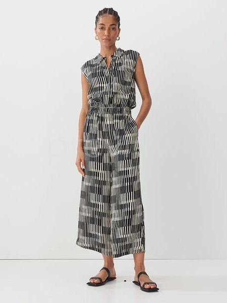 Someday Kombinezon w kolorze czarno-kremowym rozmiar: 42. Brązowe kombinezony damskie Someday, bez wzorów, z wiskozy, bez kołnierzyka, bez ramiączek. Za 282.99 zł.