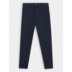 Spodnie Męskie TBS Pavlopan. Niebieskie spodnie materiałowe męskie Tbs, bez wzorów, eleganckie. Za 339.00 zł.