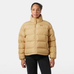 Damska kurtka puchowa Helly Hansen YU 23. Brązowe kurtki damskie Helly Hansen, bez wzorów, z puchu, bez kaptura. W wyprzedaży za 682.50 zł.