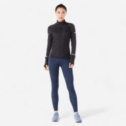 Bluza do biegania damska Kiprun Vest Warm ocieplana. Czarne bluzy bez kaptura damskie KIPRUN, l, bez wzorów, z materiału, bez kaptura. Za 199.99 zł.