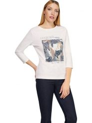 Heine Koszulka w kolorze kremowym rozmiar: 42. Brązowe bluzki damskie Heine, bez wzorów, z bawełny, bez kołnierzyka, bez ramiączek. Za 78.66 zł.