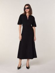 Rodier Wełniana sukienka w kolorze czarnym rozmiar: S. Czarne sukienki damskie Rodier, s, bez wzorów, z wełny, bez kołnierzyka, bez ramiączek, midi. Za 478.99 zł.