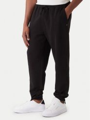 Tommy Hilfiger Spodnie dresowe Essential MW0MW37236 Czarny Regular Fit. Czarne spodnie dresowe męskie Tommy Hilfiger, bez wzorów, z bawełny. Za 469.99 zł.