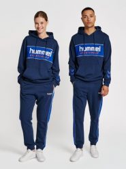 Bluza z kapturem Hummel Legacy Julian. Niebieskie bluzy sportowe damskie HUMMEL, s, bez wzorów, z bawełny, bez ramiączek, długie, z kapturem. Za 194.50 zł.