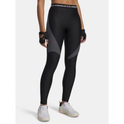 Legginsy Under Armour HeatGear Rib. Czarne legginsy damskie Under Armour, bez wzorów. Za 144.14 zł.