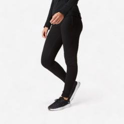 Spodnie dresowe damskie Domyos Gym & Pilates 520 slim. Czarne spodnie sportowe damskie DOMYOS, l, z bawełny, na fitness i siłownię. Za 99.99 zł.