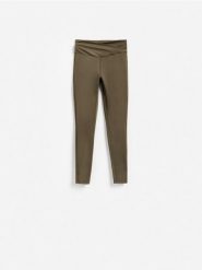 Gładkie legginsy - ciemnozielony. Zielone legginsy damskie Reserved, l, bez wzorów, z dzianiny. Za 89.99 zł.