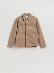Jeansowa koszula comfort fit - brązowy. Brązowe koszule męskie Reserved, l, bez wzorów, z bawełny, bez kołnierzyka, bez ramiączek. Za 149.99 zł.