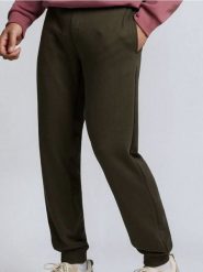 Spodnie jogger slim fit - zielony. Zielone spodnie materiałowe męskie Sinsay, bez wzorów. Za 29.99 zł.