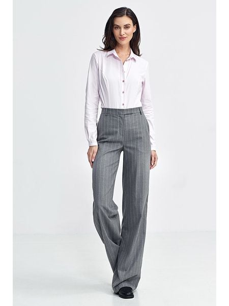 Nife Spodnie w kolorze szarym rozmiar: 42. Szare spodnie materiałowe damskie Nife, bez wzorów, z materiału. Za 200.60 zł.